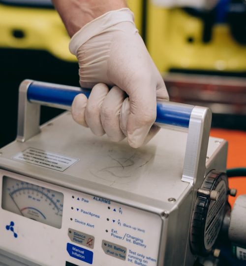 Person Holding a Newport Ventilator